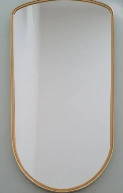 Grand miroir ovoïde vintage à bords dorés et noir - années 1960