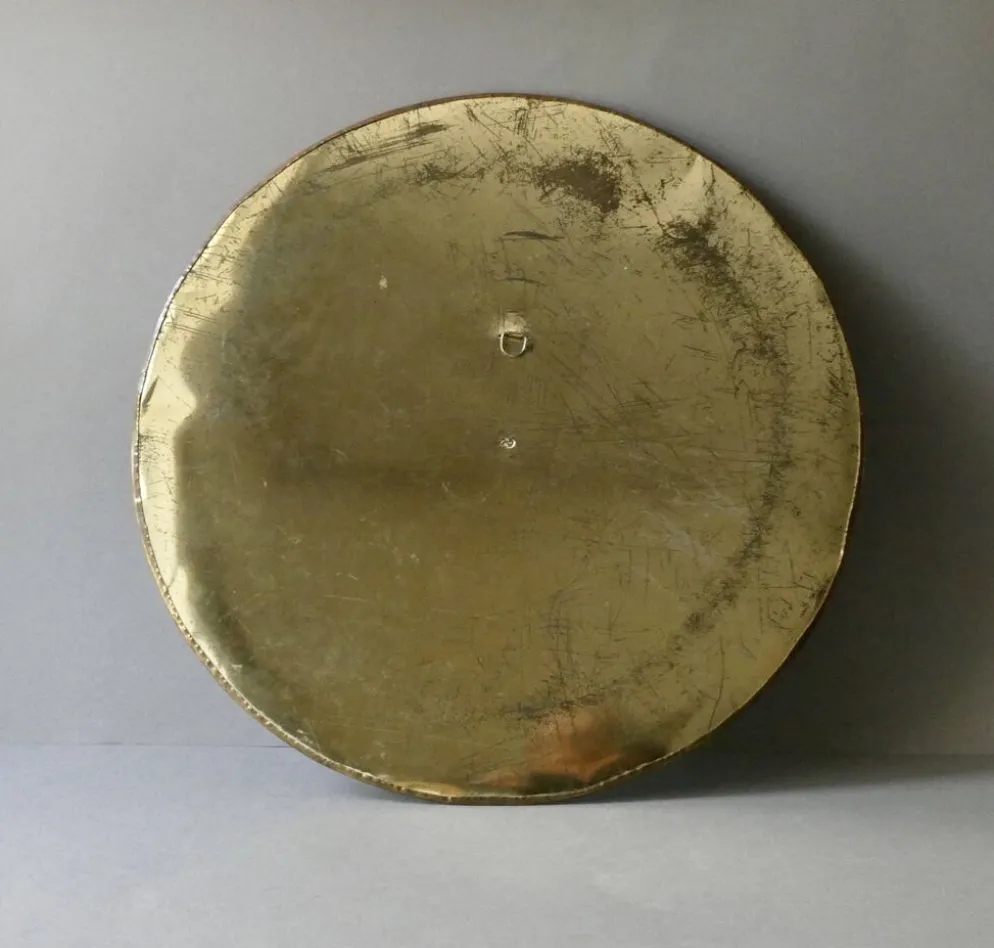 Grand miroir rond marocain en laiton rt cuivre ciselé, années 70-80