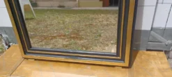 Grand miroir vintage dans le style des annees 1970 noir et dore 109 x79 cm