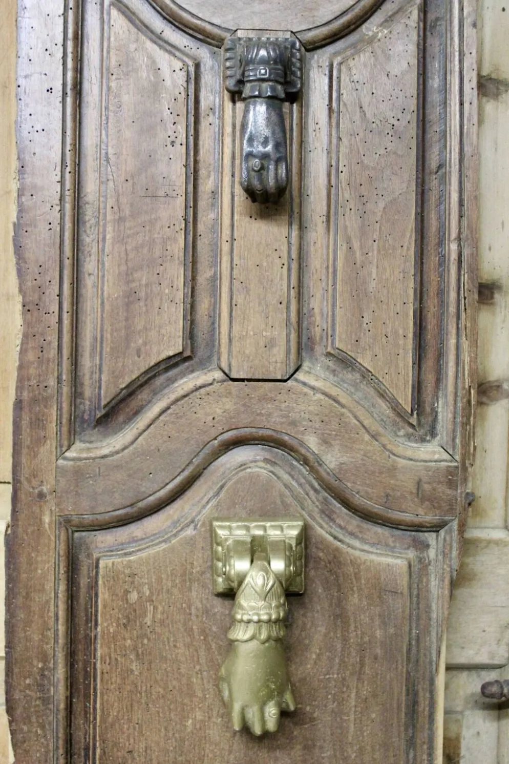 Heurtoir en bronze plein, forme de main, XIXème