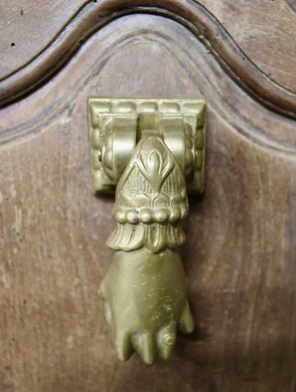 Heurtoir en bronze plein, forme de main, XIXème