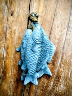 Heurtoir en fonte trio de poissons