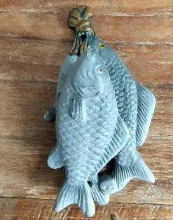 Heurtoir en fonte trio de poissons