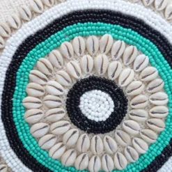 Housse de coussin Aussa avec deco en coquillages