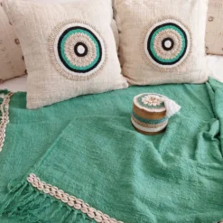 Housse de coussin Aussa avec deco en coquillages