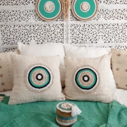Housse de coussin Aussa avec deco en coquillages
