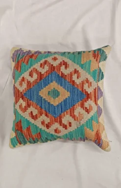 Housse de coussin géométrique turquoise, coussin en laine kilim vintage pour décoration intérieure.