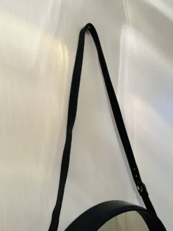 Jacques Adnet paire de miroirs circulaires cuir et laiton