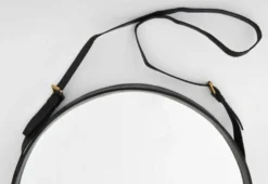 Jacques Adnet paire de miroirs circulaires cuir et laiton