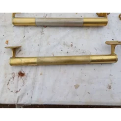Lot de 12 poignées de portes en laiton art déco