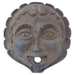 Mascaron masque en fonte visage