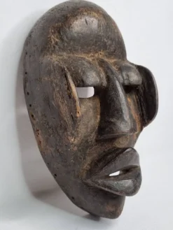 Masque Dan - Côte d'Ivoire - Milieu XXe siècle - Bois sculpté, 24 cm