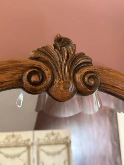 Miroir ancien biseauté, cadre en chêne