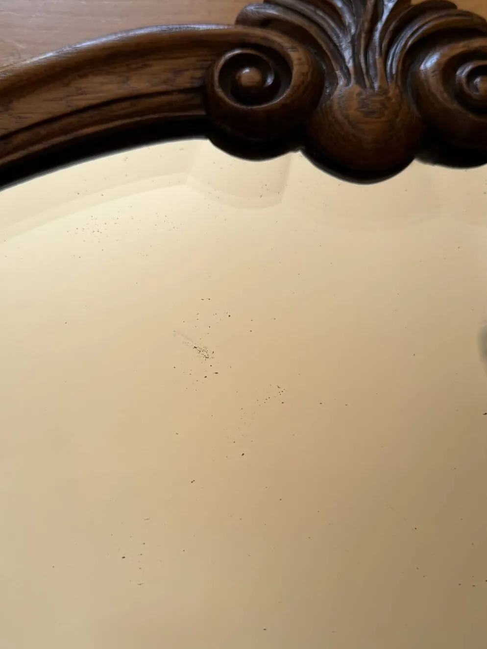 Miroir ancien biseauté, cadre en chêne