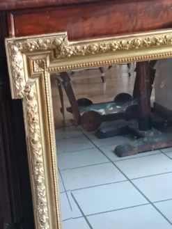 Miroir ancien bois et stuc doré néo Louis XVI