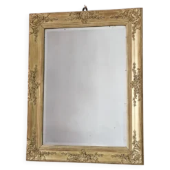 Miroir ancien doré richement sculpté