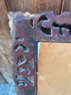 Miroir ancien en bois sculpté
