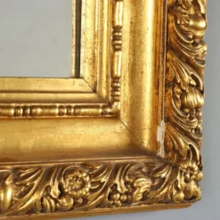Miroir ancien en bois sculpté et doré, Italie, XXe siècle