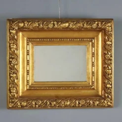 Miroir ancien en bois sculpté et doré, Italie, XXe siècle