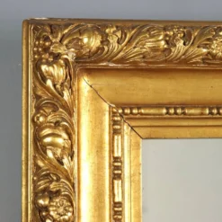 Miroir ancien en bois sculpté et doré, Italie, XXe siècle