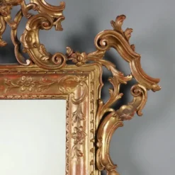 Miroir ancien en bois sculpté et doré, Italie, début XXe siècle