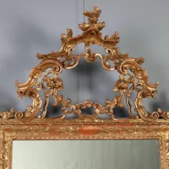 Miroir ancien en bois sculpté et doré, Italie, début XXe siècle