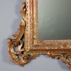 Miroir ancien en bois sculpté et doré, Italie, début XXe siècle
