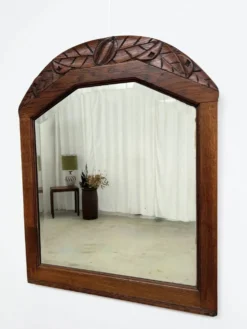 Miroir art déco en chêne motif sculpté