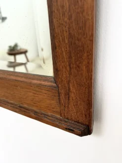 Miroir art déco en chêne motif sculpté