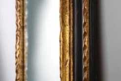 Miroir baroque en bois noir et doré sculpté, France années 1850.