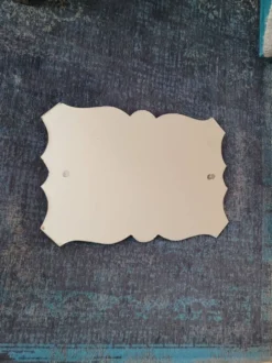 Miroir biseauté ancien à suspendre