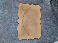 Miroir biseauté ancien à suspendre