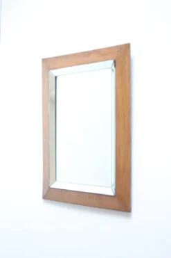 Miroir biseauté Art déco dans un cadre en chêne, années 1940.