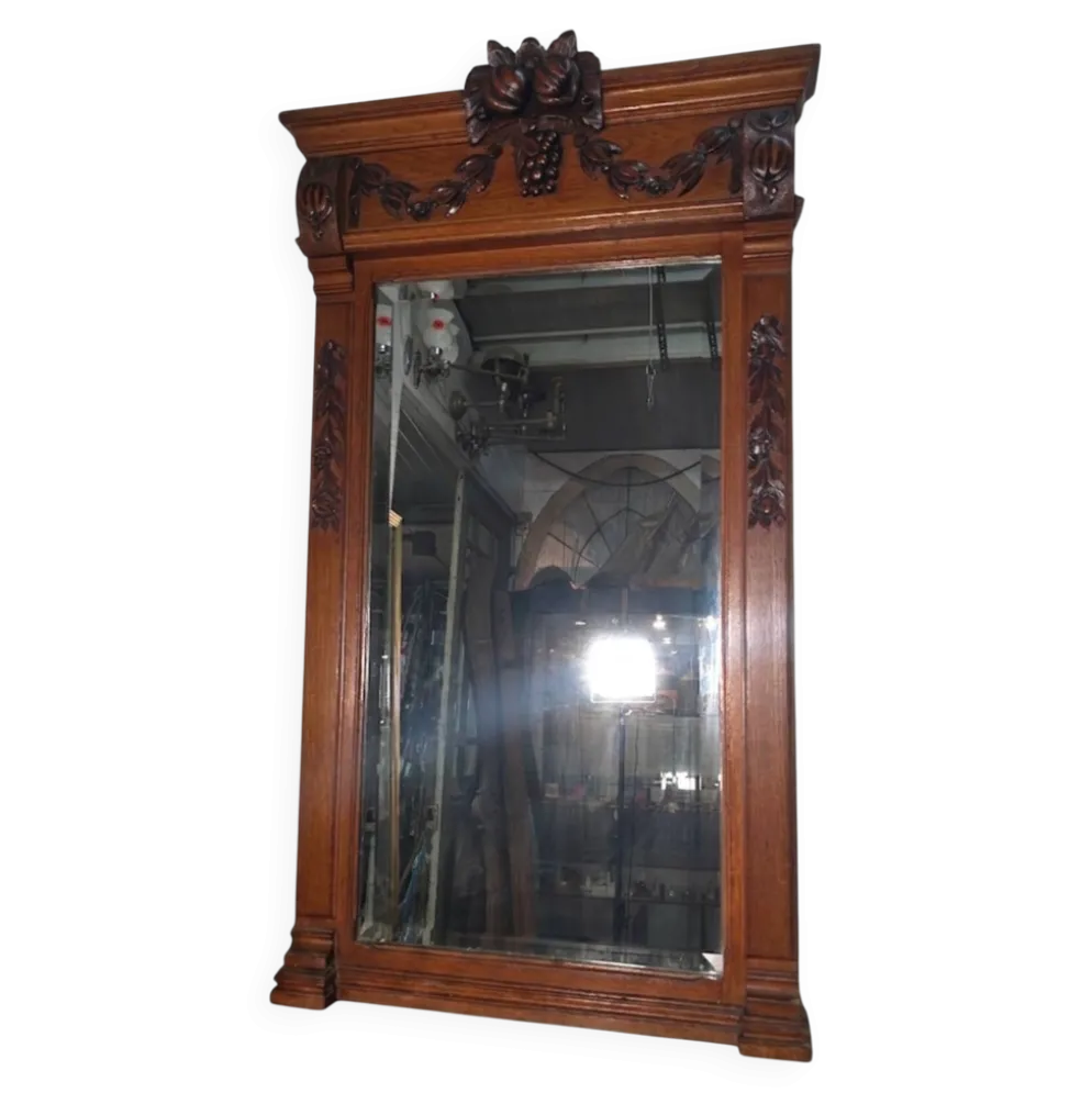 Miroir biseauté en bois sculpté