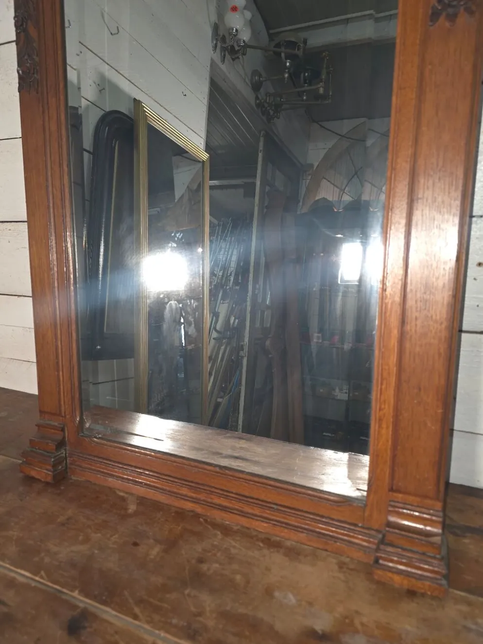 Miroir biseauté en bois sculpté