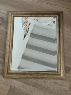 Miroir biseauté sous cadre doré