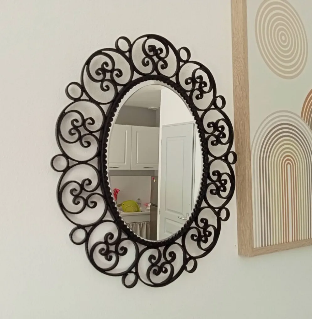 Miroir biseauté vintage en fer forgé style Chaty Vallauris