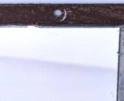 Miroir brutaliste métal et verre serti