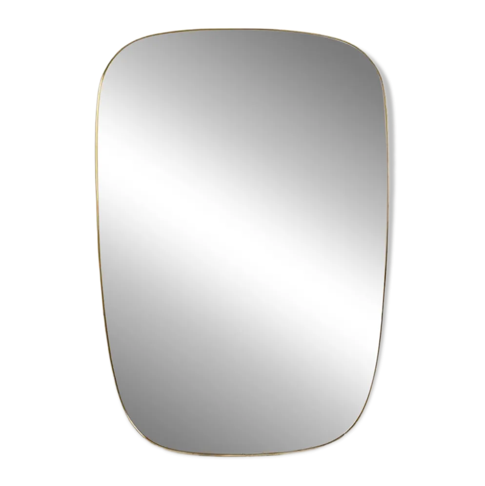 Miroir cerclé de laiton doré. 1980