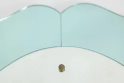 Miroir-console en verre bicolore et laiton doré. Circa 1950.