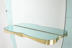 Miroir-console en verre bicolore et laiton doré. Circa 1950.