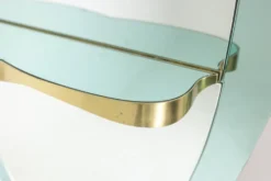 Miroir-console en verre bicolore et laiton doré. Circa 1950.