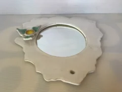 Miroir céramique bord dentelé avec une fleur