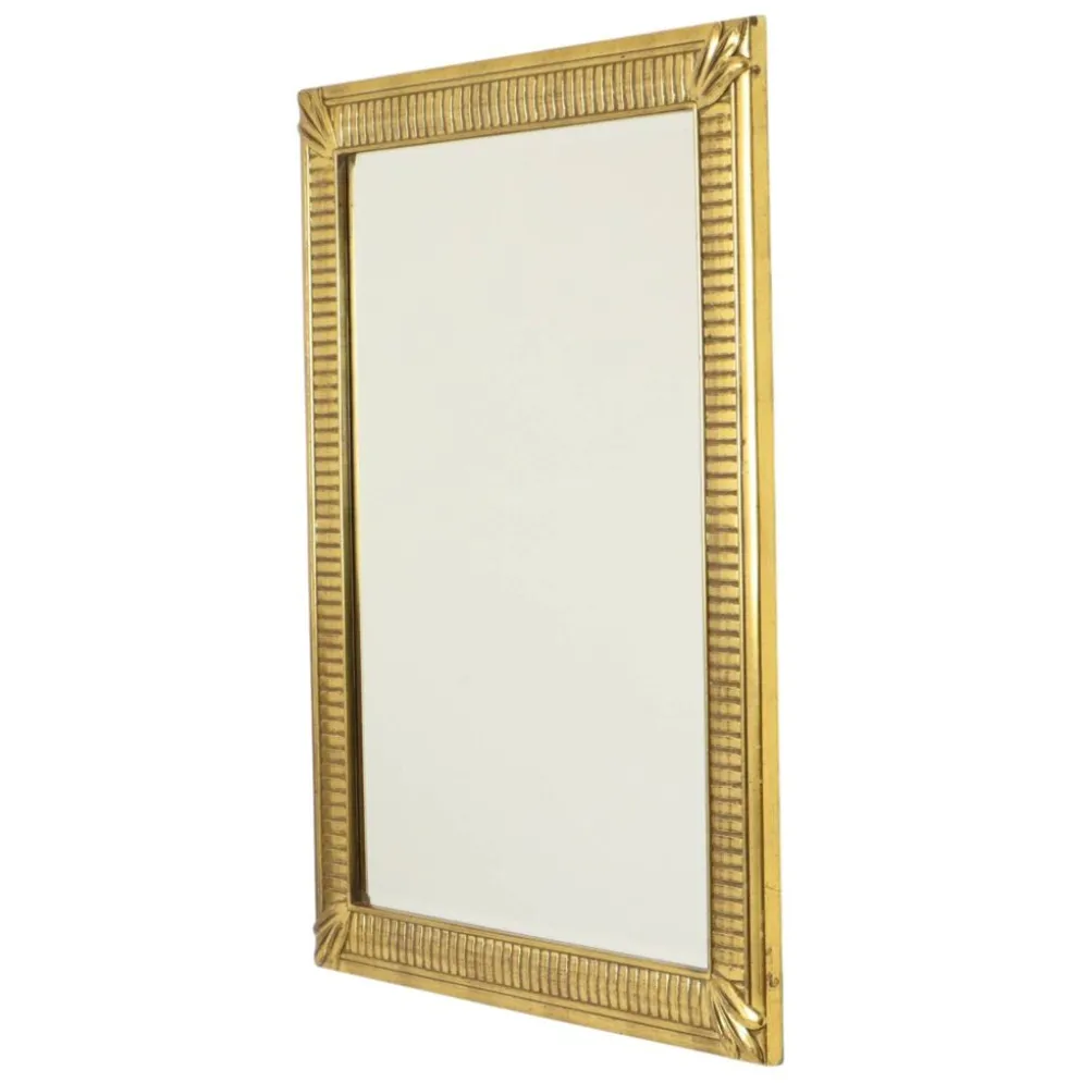 Miroir Deknudt en or Hollywood Regency biseauté 92 cm