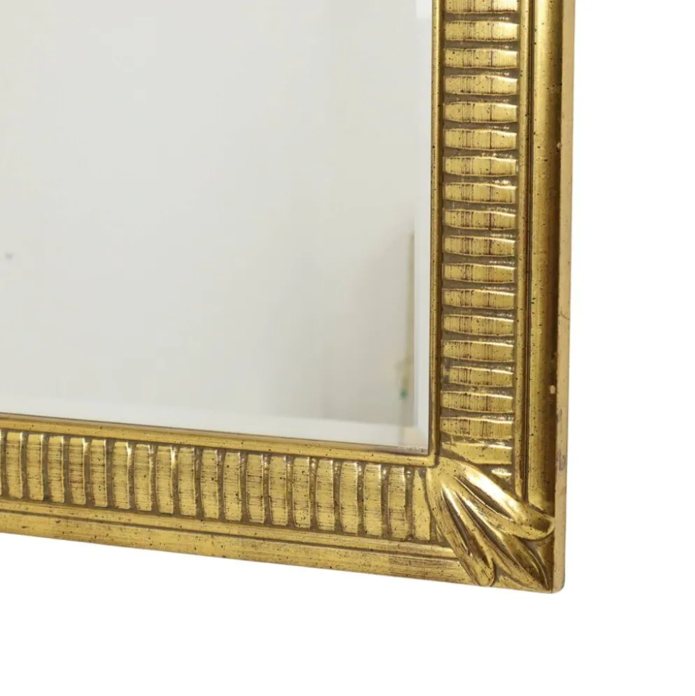 Miroir Deknudt en or Hollywood Regency biseauté 92 cm