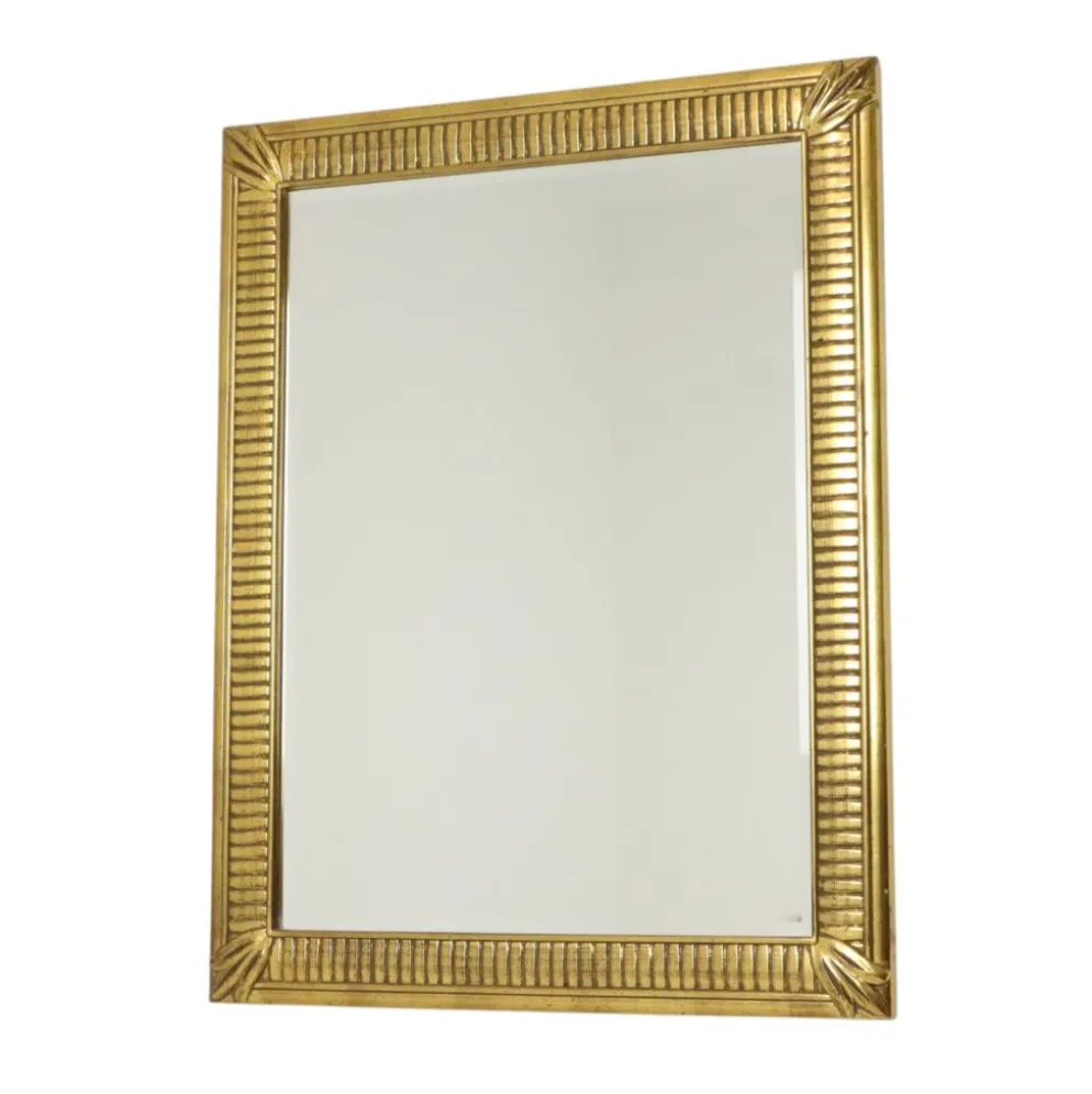 Miroir Deknudt en or Hollywood Regency biseauté 92 cm