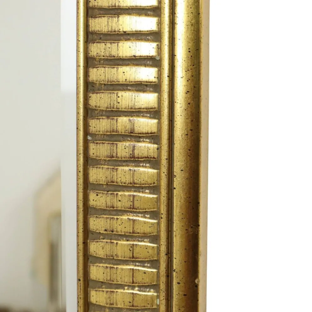 Miroir Deknudt en or Hollywood Regency biseauté 92 cm