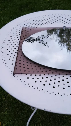Miroir des années 70 entourage en plexi fumé