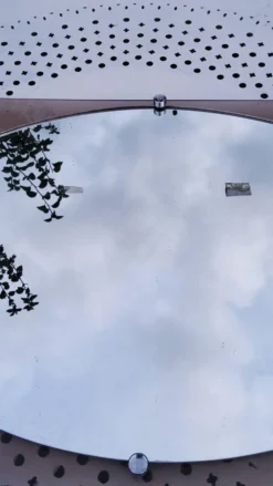 Miroir des années 70 entourage en plexi fumé