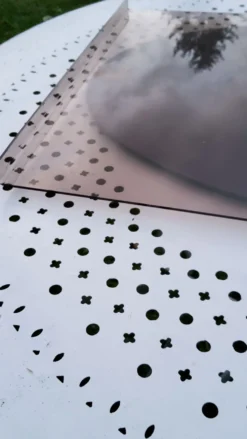 Miroir des années 70 entourage en plexi fumé